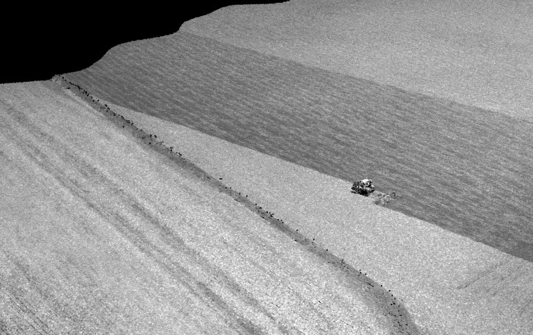 A tractor plowing the field. The intensity data makes it clear where he has been and not.